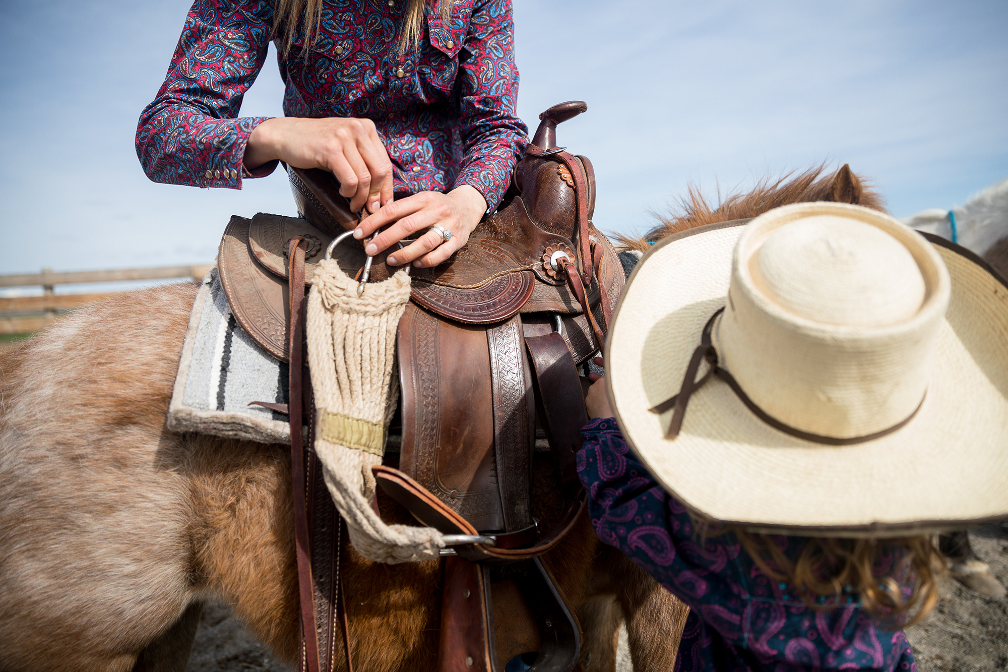 Rigging a youth saddle that Jaimie’s husband, Austin, rode when he was a child.