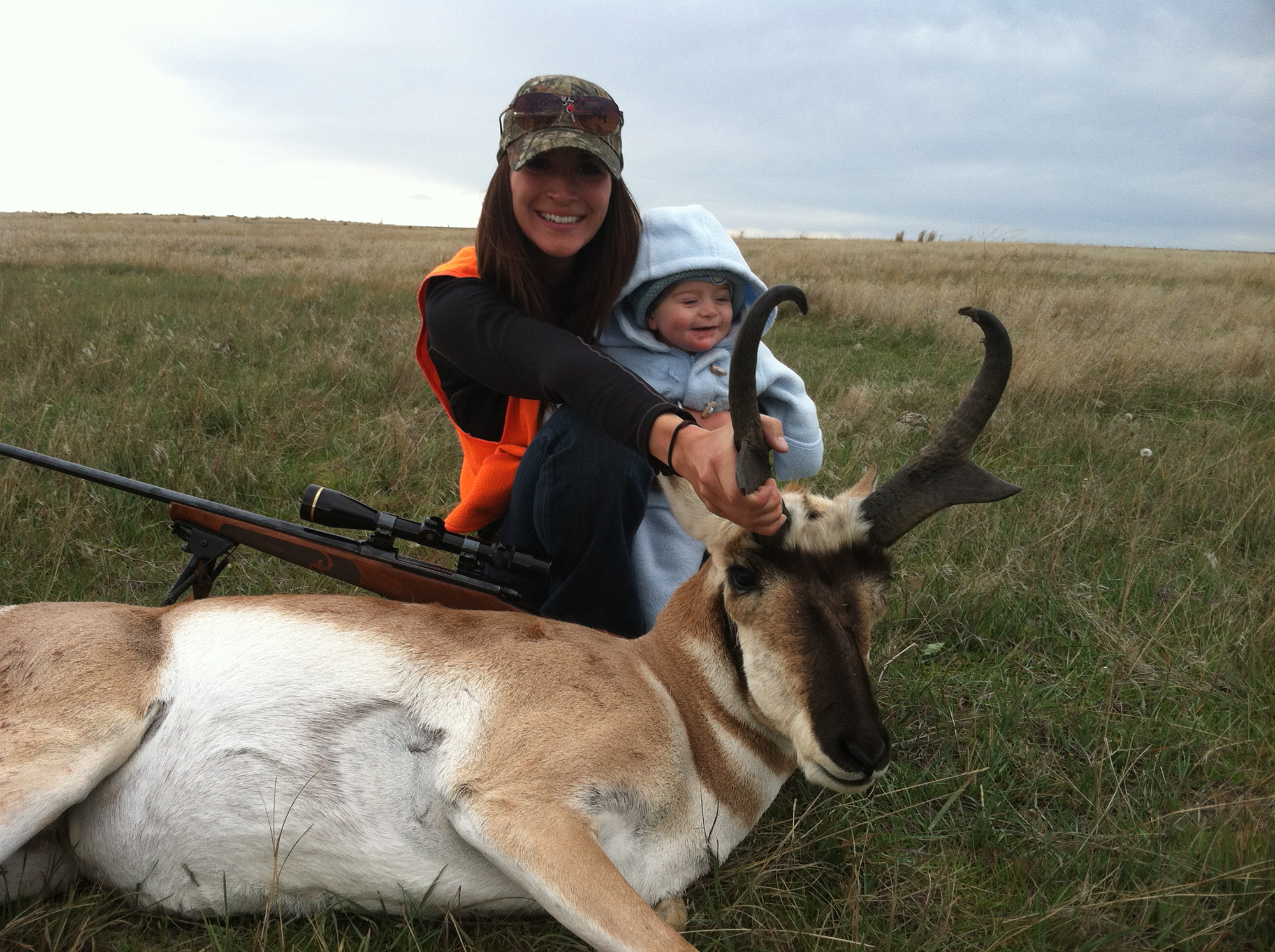 Jaimie and her son after a successful antelope hunt.