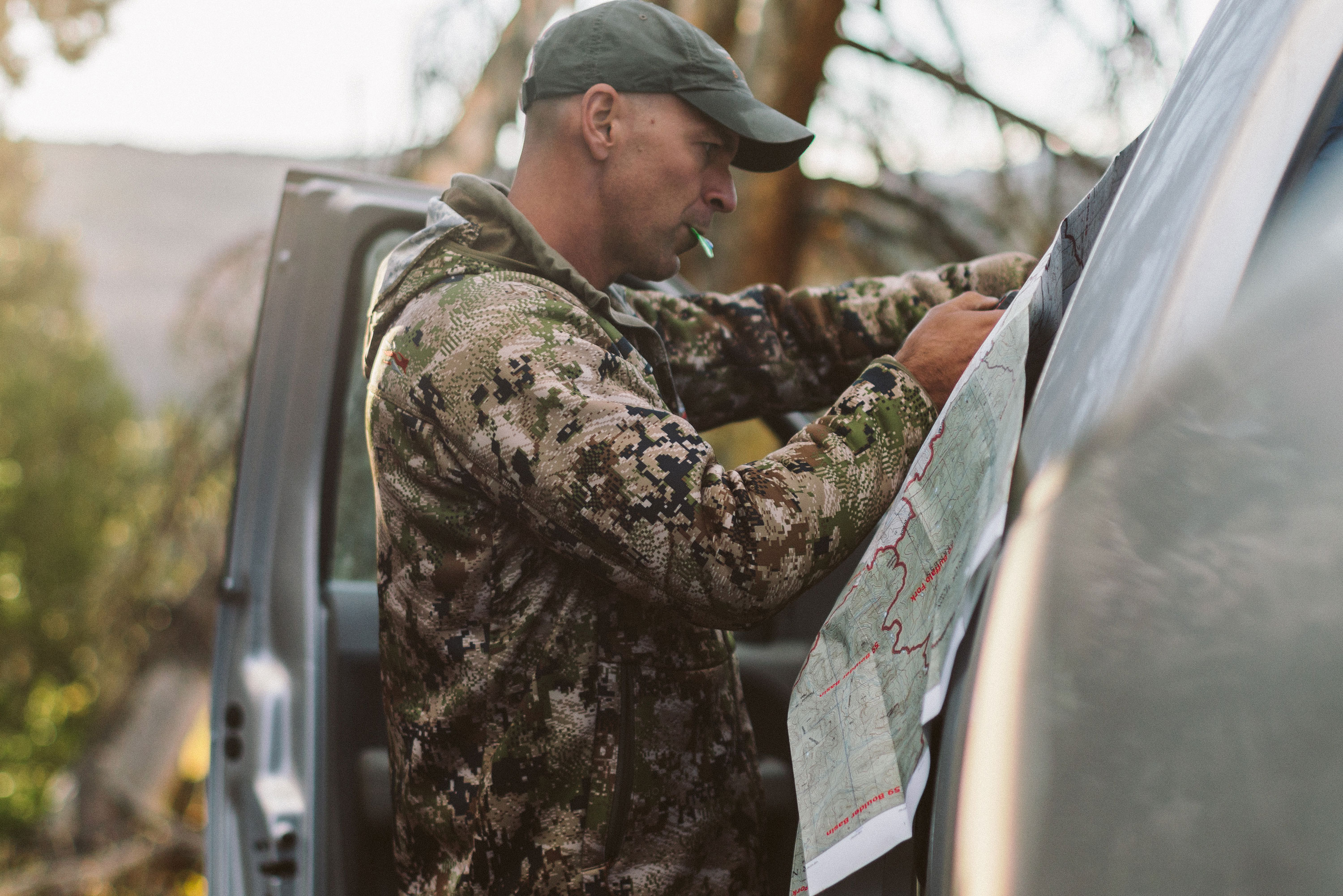 Formulating a hunting strategy before setting off into the woods.