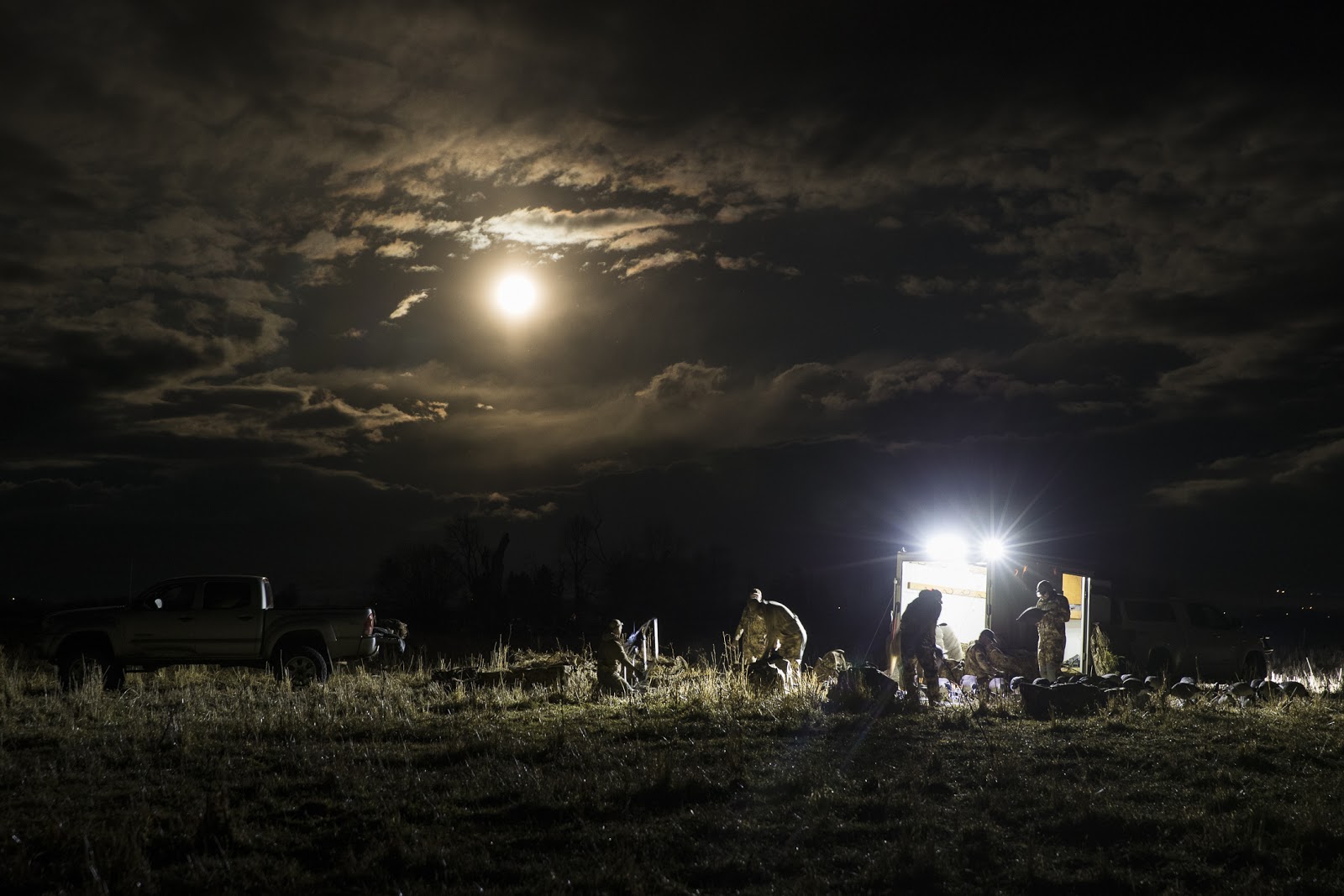 Setting up for a waterfowl hunt in the early morning.