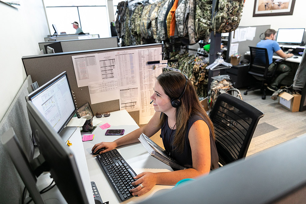 SITKA Gear customer service fielding calls from customers.