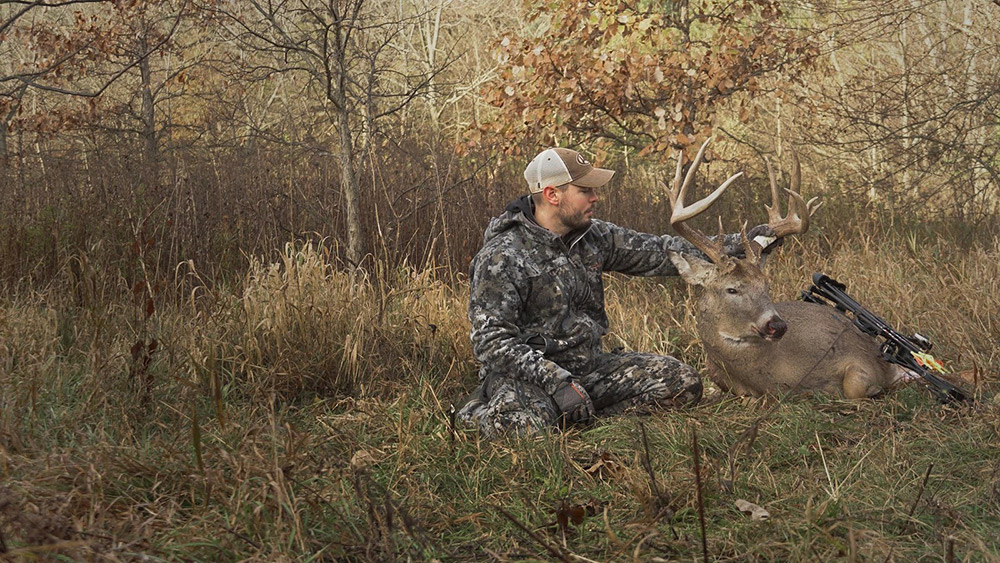 Ben Harshyne of Whitetail Properties harvests a nice buck.