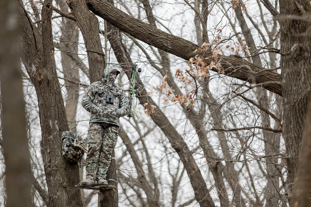 John Dudley waiting on a monster whitetail to walk out.