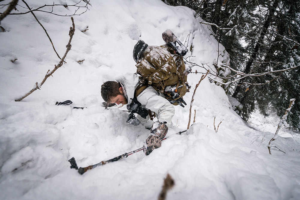 Making a tough ascent in heavy snow in SITKA whites.