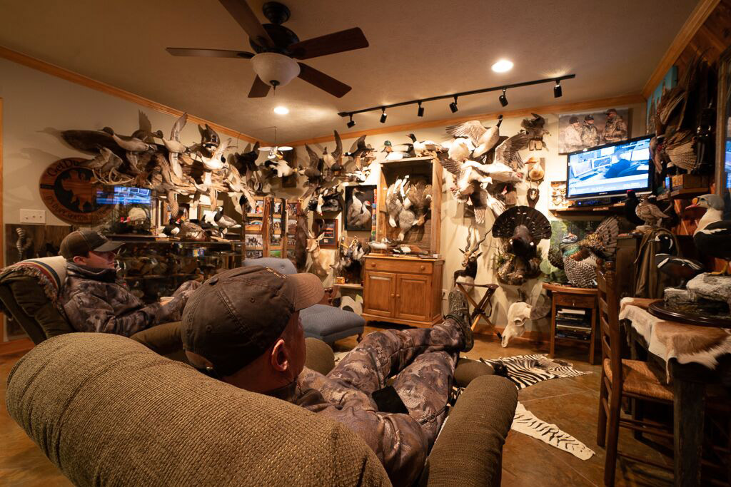 Ramsey Russell relaxes at his duck hunting cabin in Mississippi.